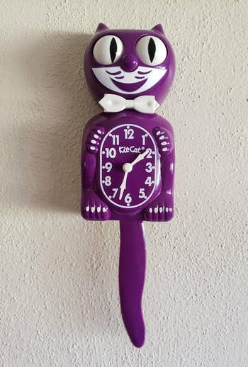 reviewer's clock in purple