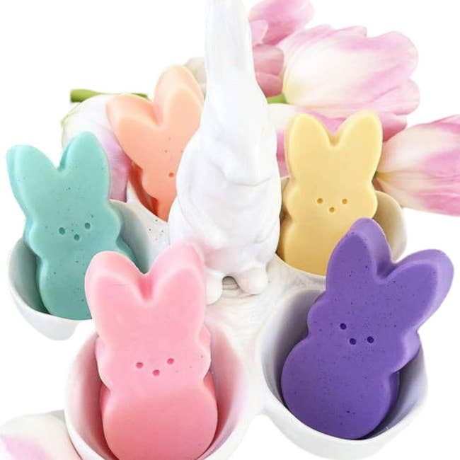 Easter-themed ceramic holder with bunny-shaped bars of soap in various colors