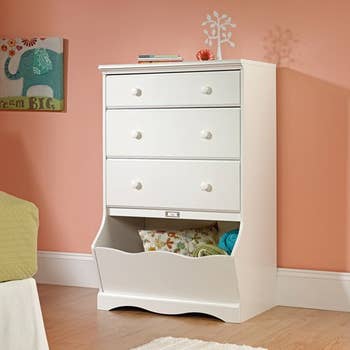 three-drawer dresser with cubby in kid's bedroom