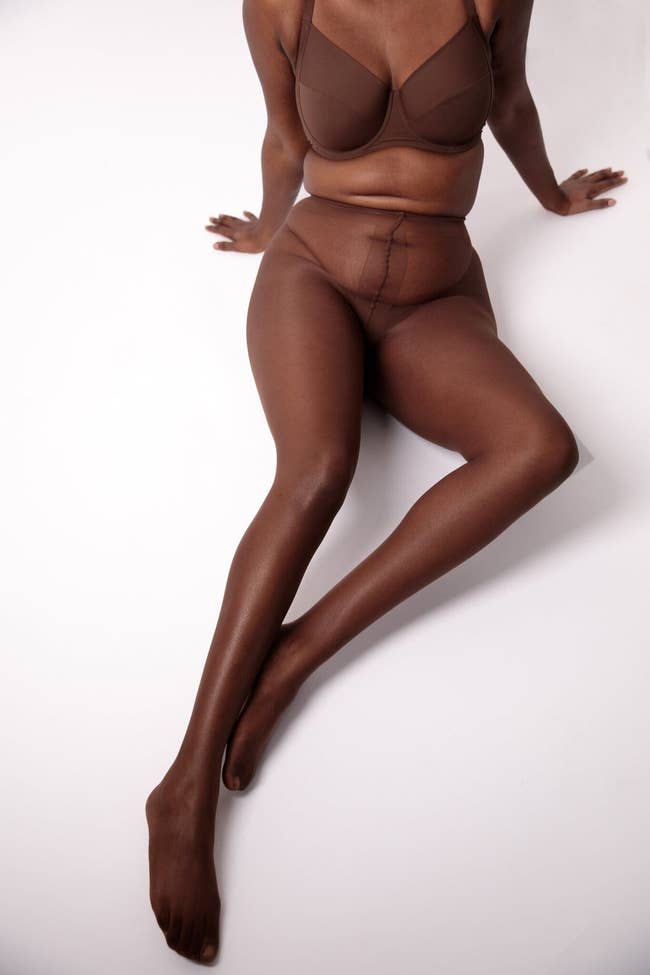model wearing nude sheer tights
