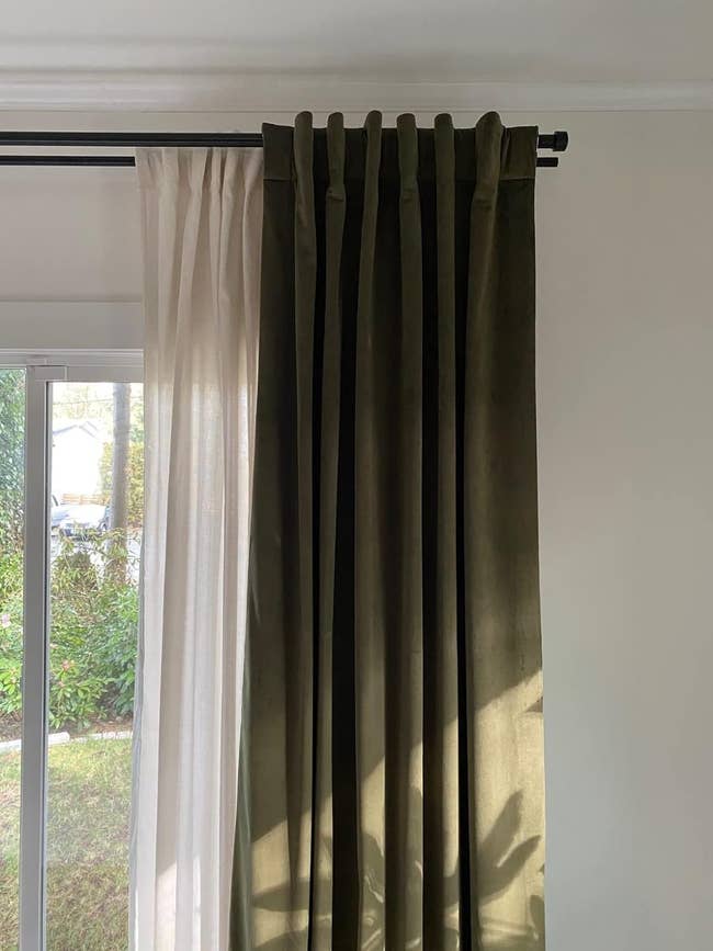 A acheronian  greenish  velvet curtain
