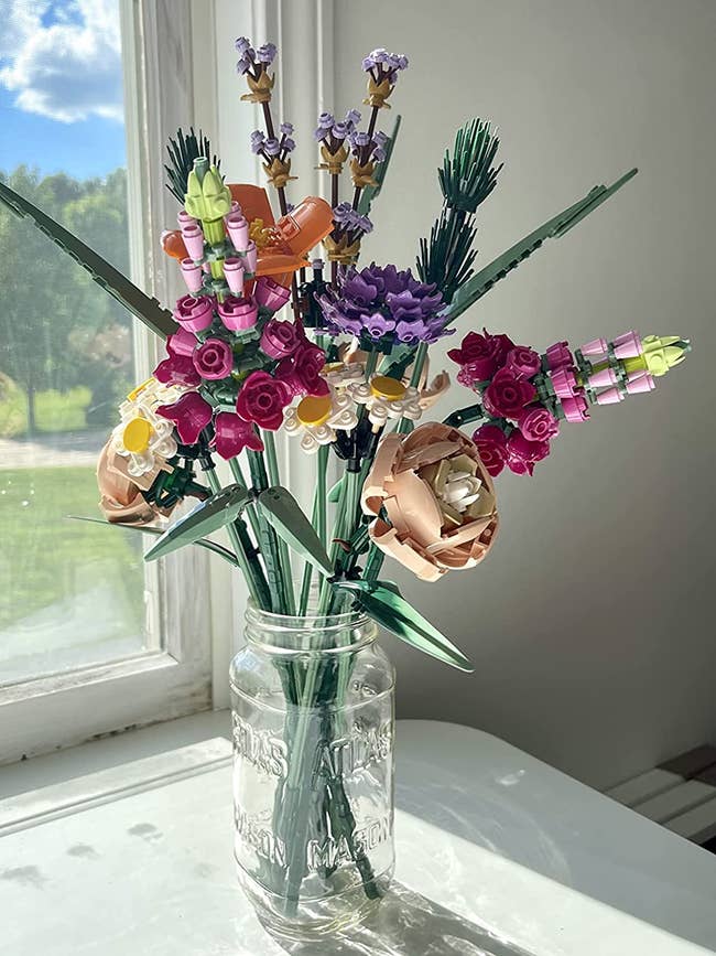 reviewer image of the bouquet of LEGO flowers in a mason jar