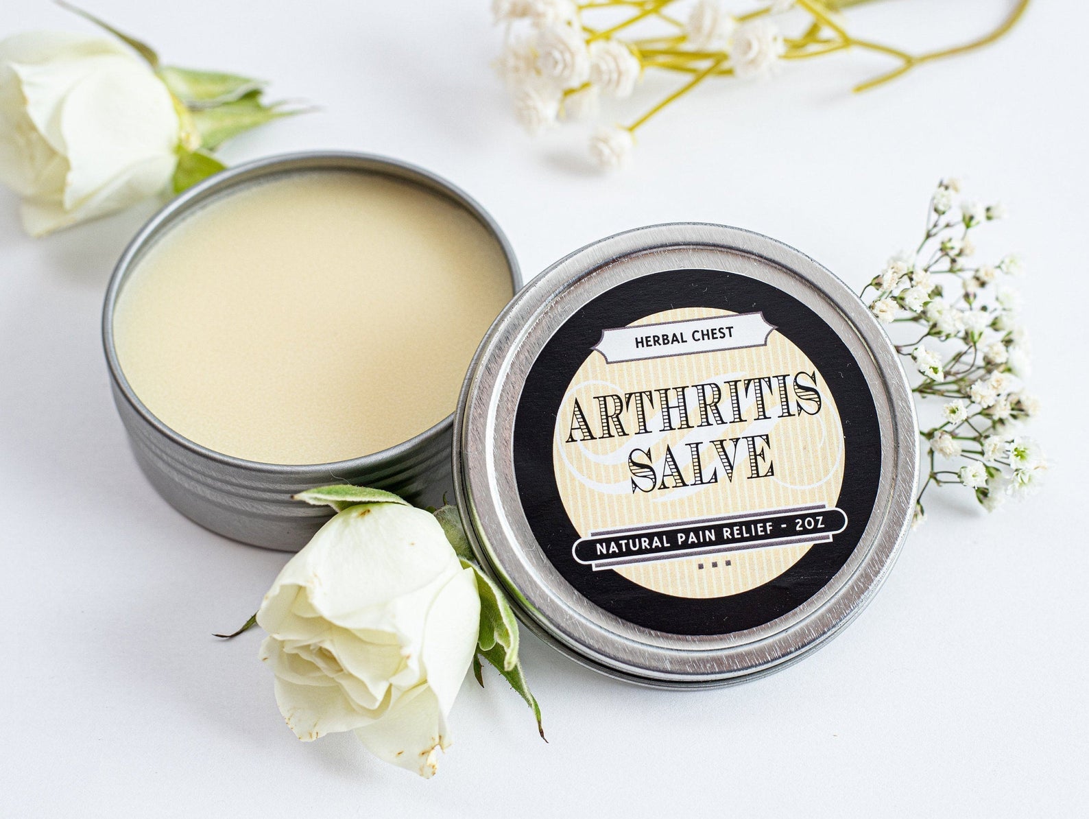 A tin of arthritis salve as a white balm 