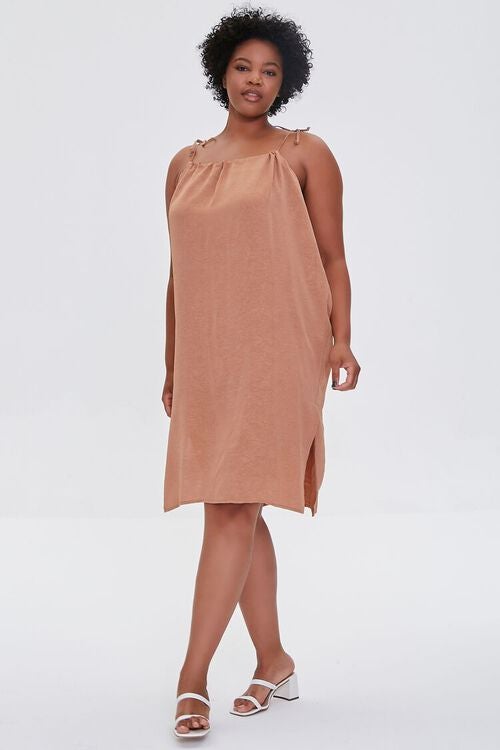 the tan colored dress