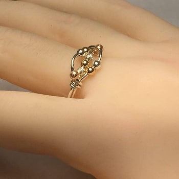person wearing ring