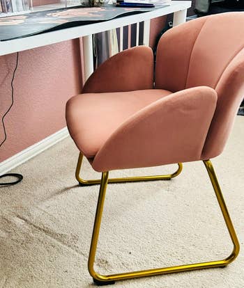 pink velvet chair with gold legs