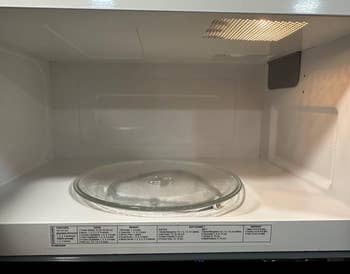 reviewer's clean microwave after using Angry Mama