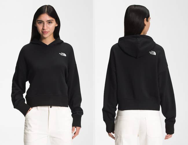 Two images of model wearing black hoodie with white pants