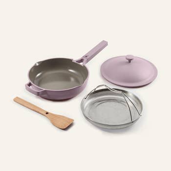 lavender pan with steamer basket and colander and spatula