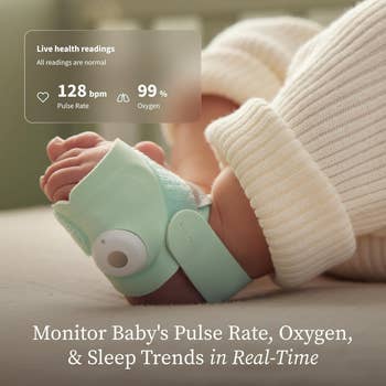 Baby wearing a wellness  monitoring instrumentality  connected  foot, showing pulse complaint   and oxygen levels. Text promotes real-time monitoring of baby's captious   signs