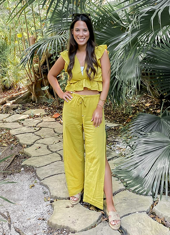 reviewer wearing the turmeric colored set
