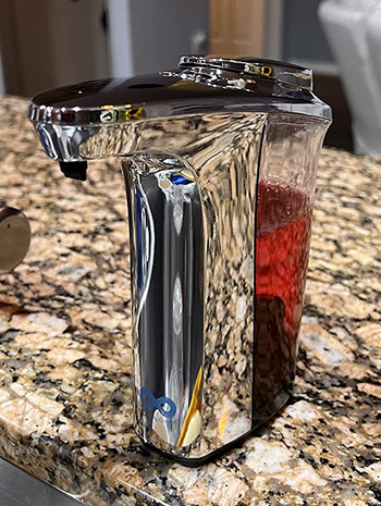 Reviewer image of the dispenser with red soap