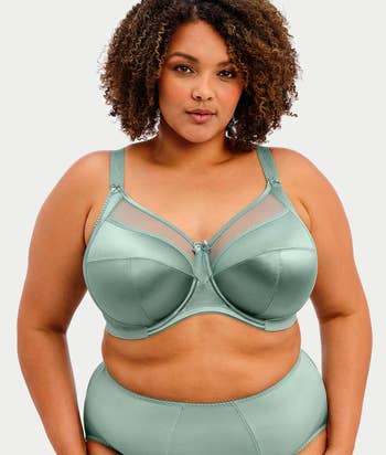 Woman modeling stylish lingerie with sheer and satin details