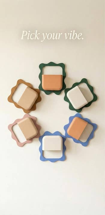 Six decorative partition  hooks with wavy frames, each   with antithetic  vibe options, beneath   the substance   