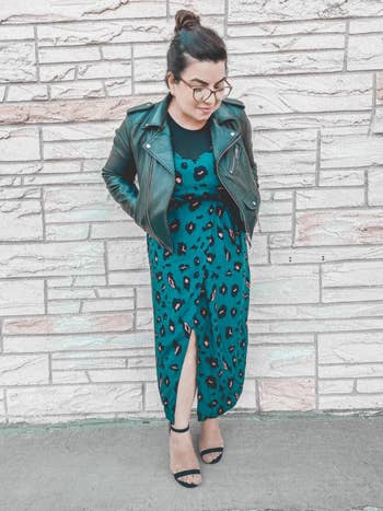reviewer in teal version layered over a top and under a moto jacket