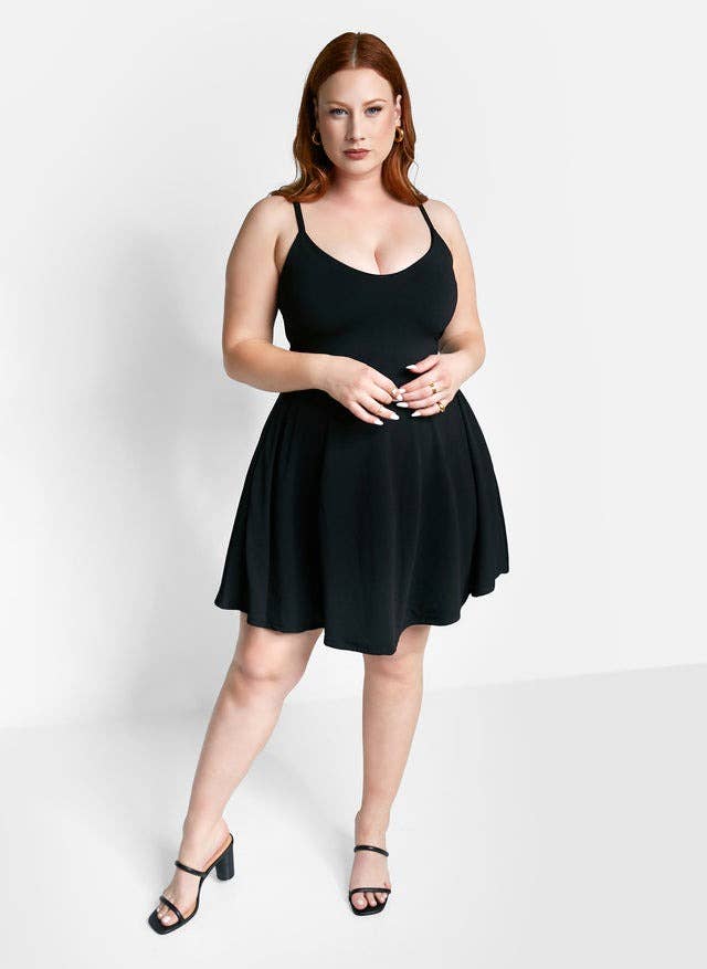 model posing successful  achromatic  skater dress