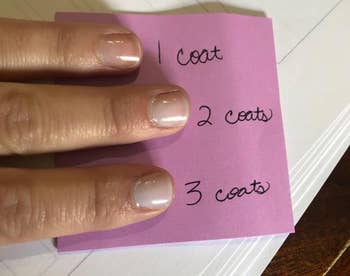 reviewer photo of their nails with 1, 2, and 3 coats of polish