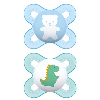 a light blue pacifier with a bear on it and a green one with a dinosaur on it