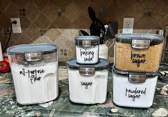 reviewers labeled canisters with baking ingredients in them