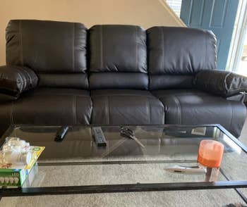 reviewer photo of the faux leather sofa