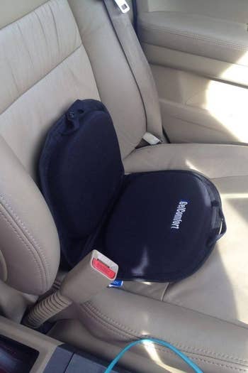 foldable seat cushion placed on car’s seat