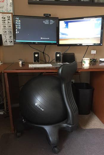 Different reviewer's exercise ball chair in front of their desk