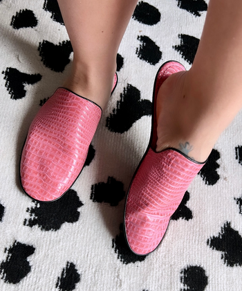 buzzfeed editor wearing the slippers in pink