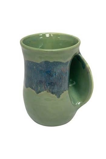 blue and green hand warming mug from the front