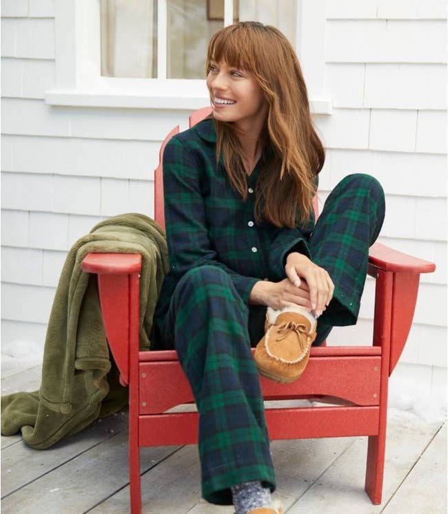 model in the green plaid set