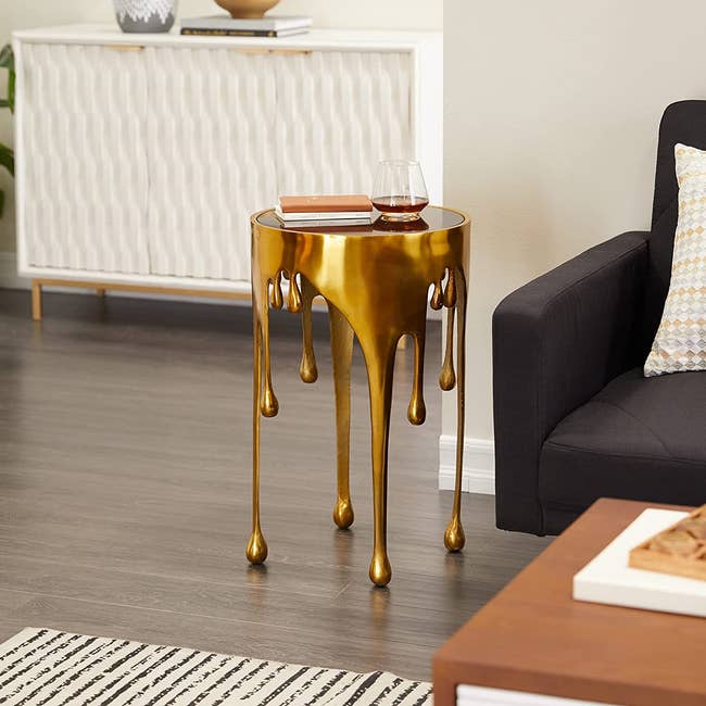 the gold end table