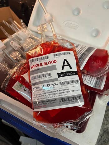 a reviewer's cooler filled with the blood bags that have a red liquid in them