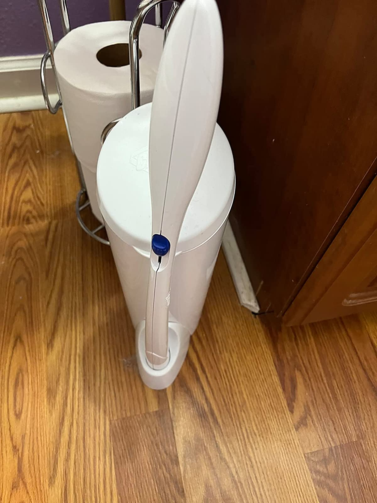 reviewer photo of the toilet wand in its stand