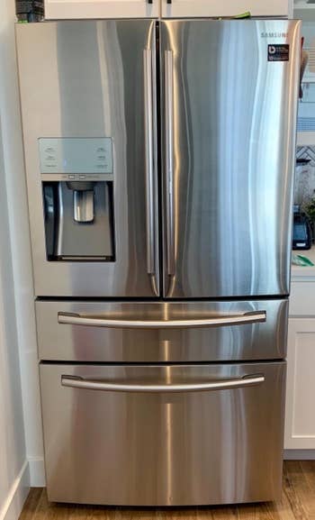 another reviewer's photo of an extremely shiny refrigerator
