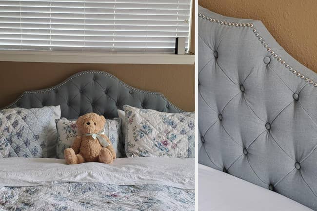 Reviewer image of silver studded gray tufted headboard with pillows and a teddy bear against it, close-up of product with mattress on it