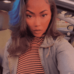 A gif of me that shows my blue and purple hair streak