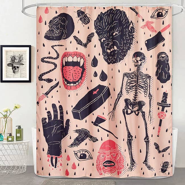 shower curtain with various horror monsters on it 