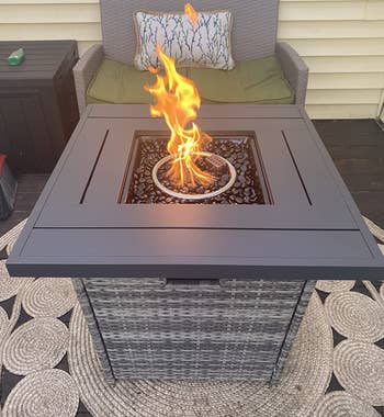 Reviewer image of the gray fire pit table