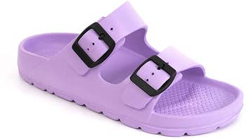 the sandals in lavender with black buckles