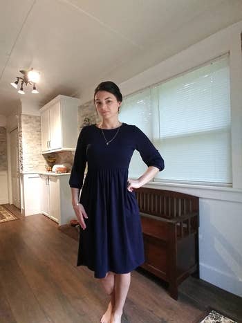 Reviewer pic of the dress in a navy blue color