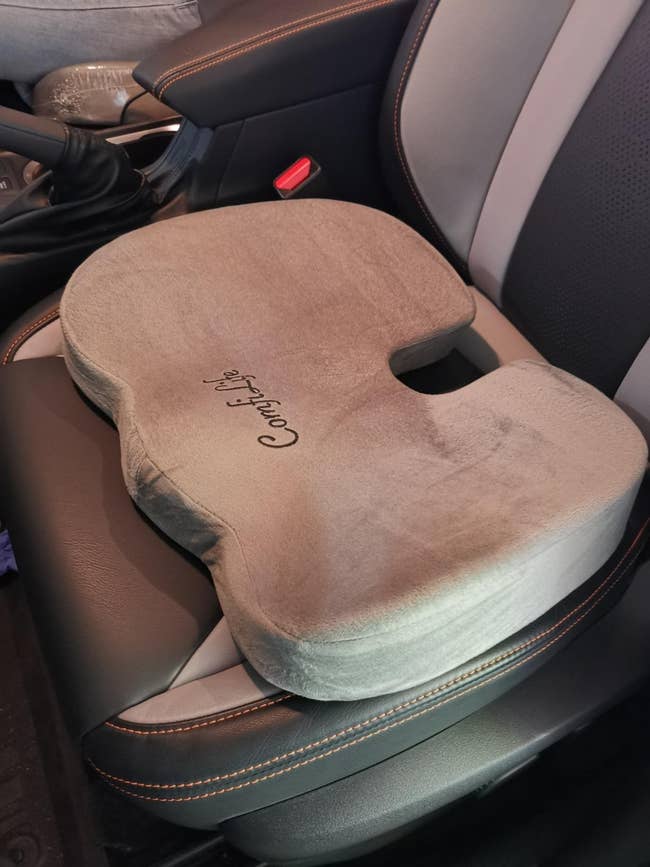 reviewer representation of the cushion connected the driver's spot of a car