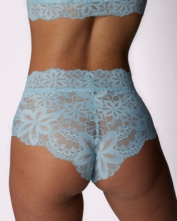 model showing the back of the underwear in light blue