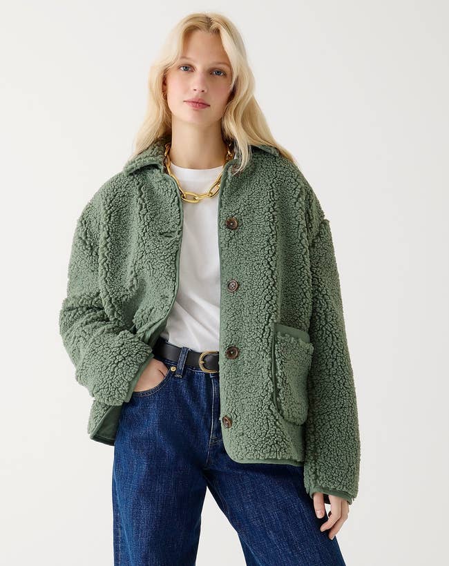 model posing in the green sherling jacket