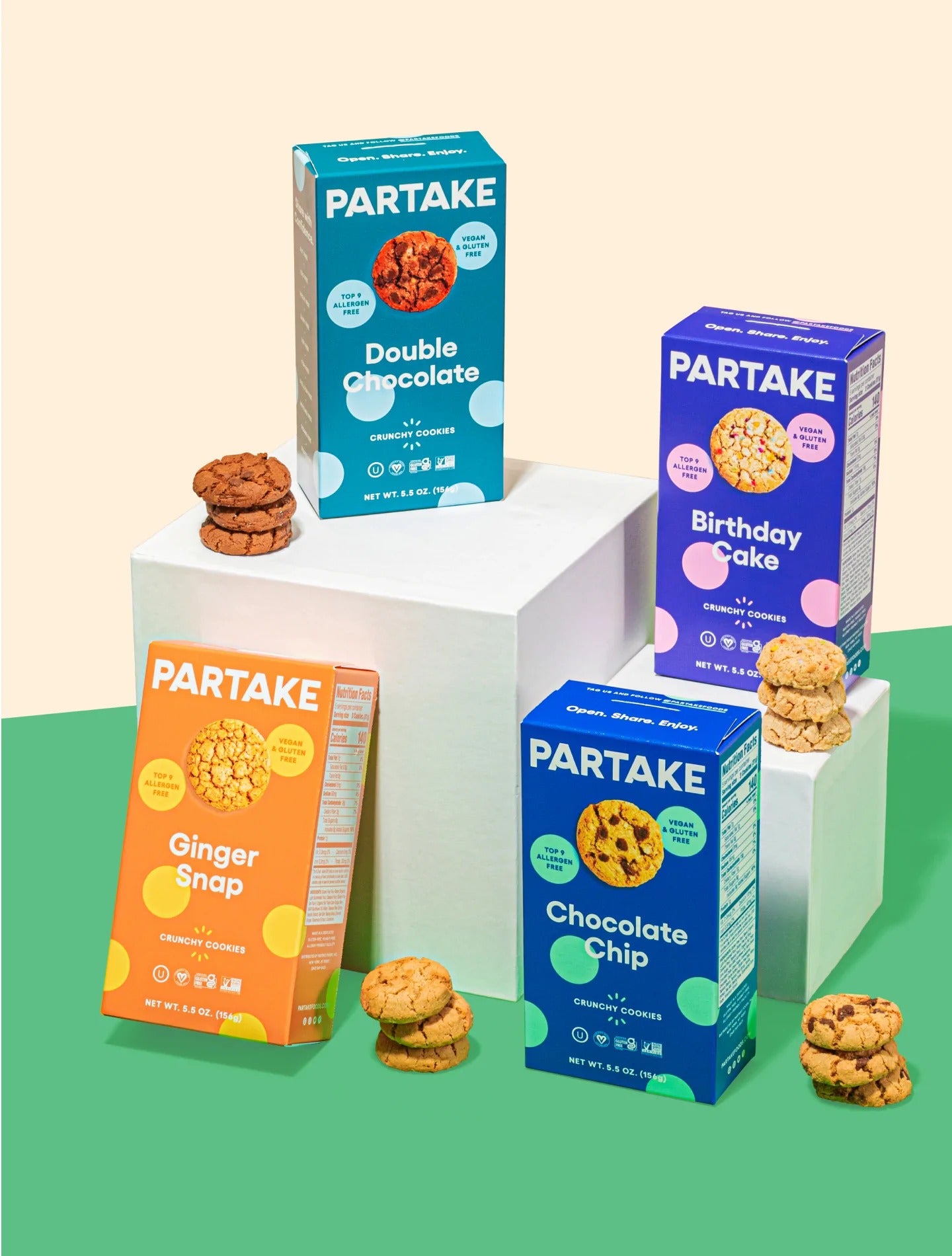four boxes of cookies in different flavors: double chocolate, birthday cake, ginger snap, and chocolate chip