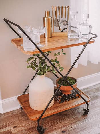Reviewer image of the black and brown bar cart
