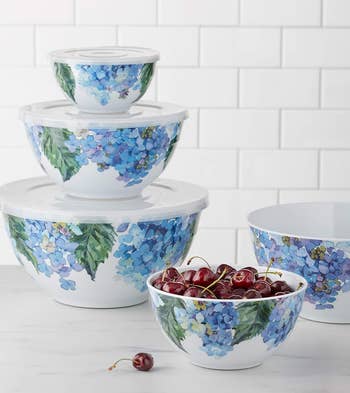 the mixing bowls in white with blue floral pattern on them