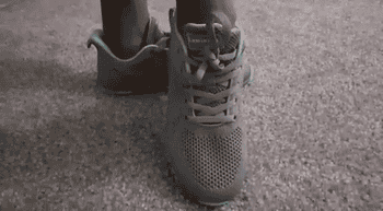 Gif of reviewer showing front and sides of Lamincoa running shoes