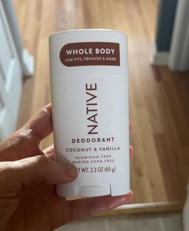 Person holding a instrumentality   of Native Coconut & Vanilla deodorant, labeled for full   assemblage  use