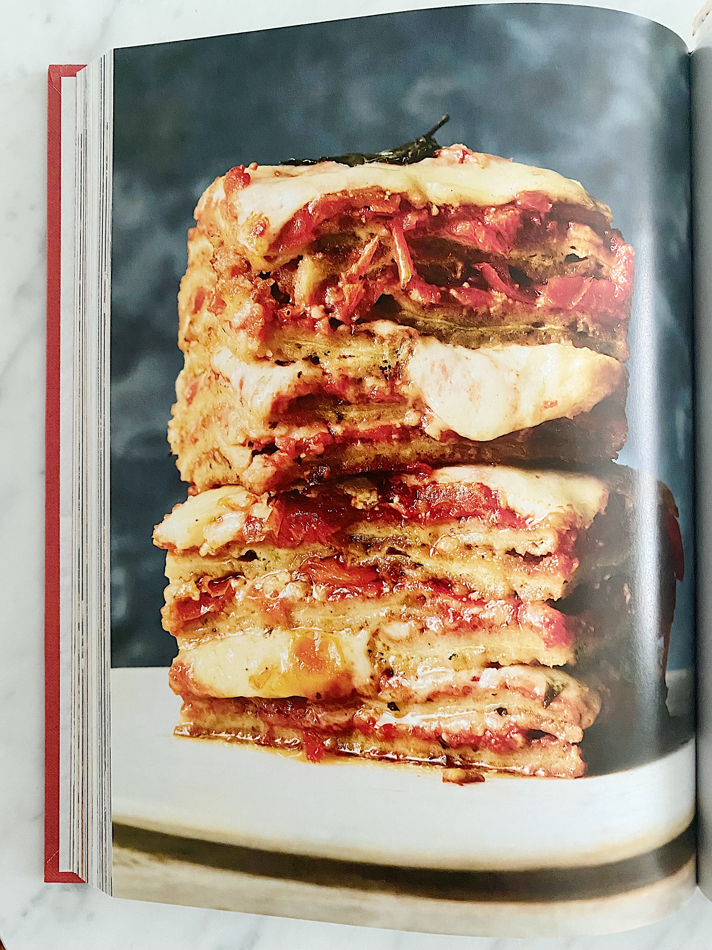 a photo of eggplant parm from the Italian American cookbook