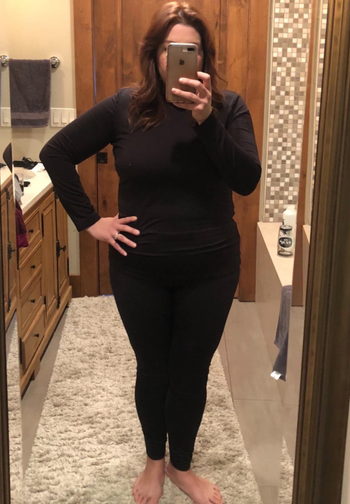 reviewer wearing the set in black