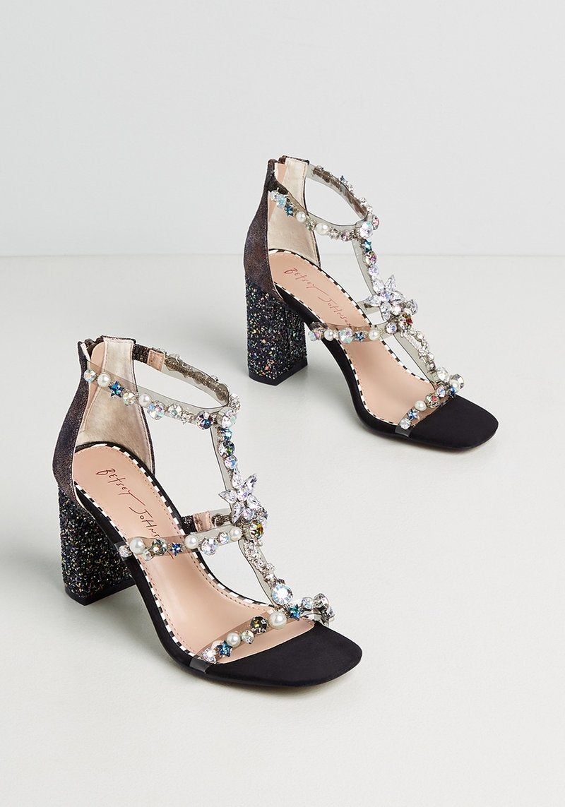 the black and bedazzled shoes